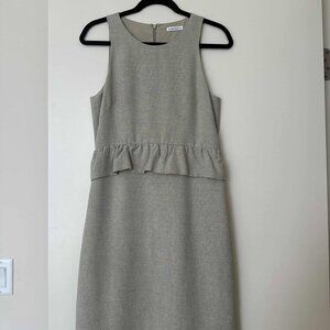 Dress with peplum detail